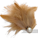 Petershams Millinery Supplies tan marabou and coque feather hat mount with a pearlescent cabochon and gold trim.
