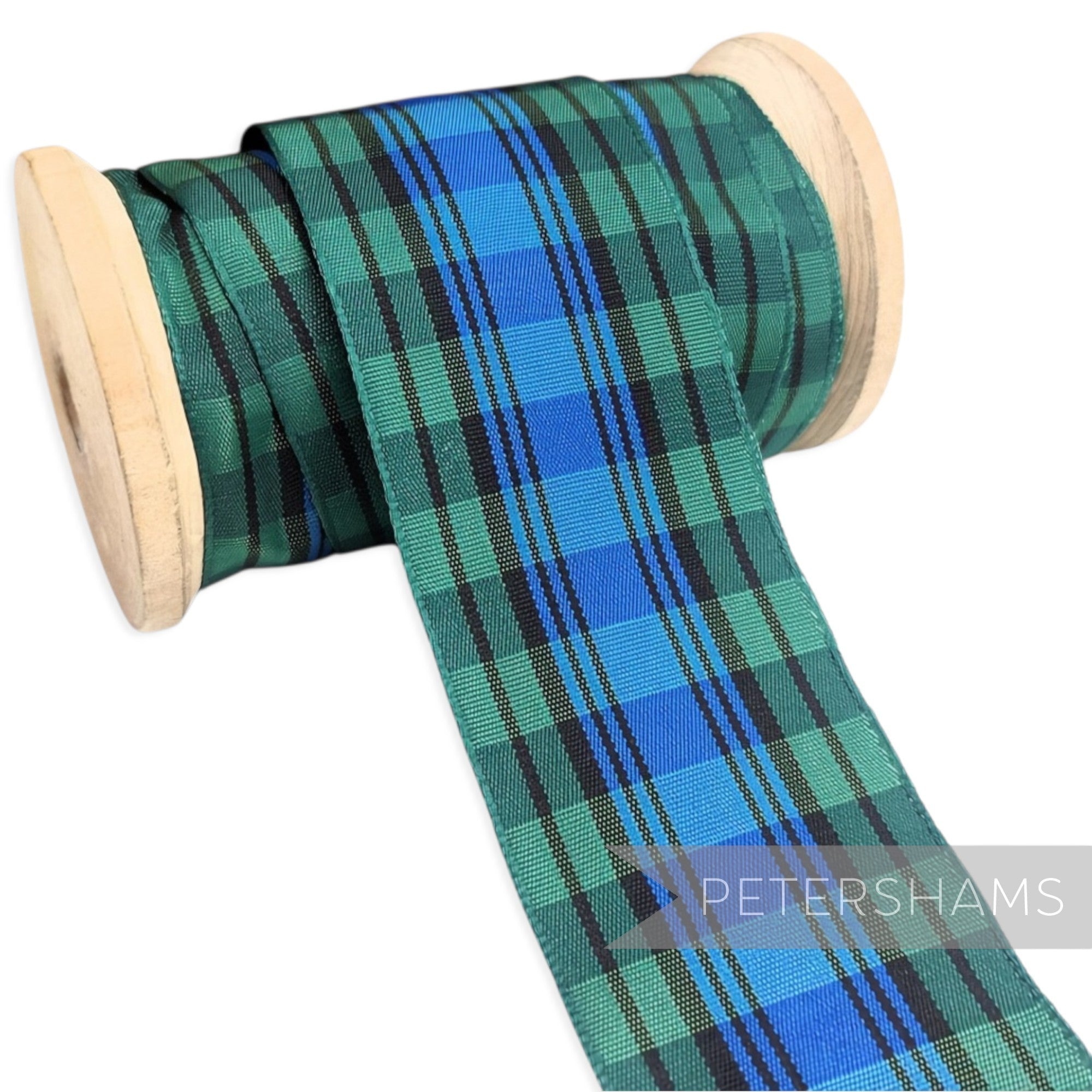 Petershams Millinery Supplies 40mm green and blue tartan woven edge polyester ribbon on a wooden spool