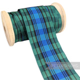 Petershams Millinery Supplies 40mm green and blue tartan woven edge polyester ribbon on a wooden spool