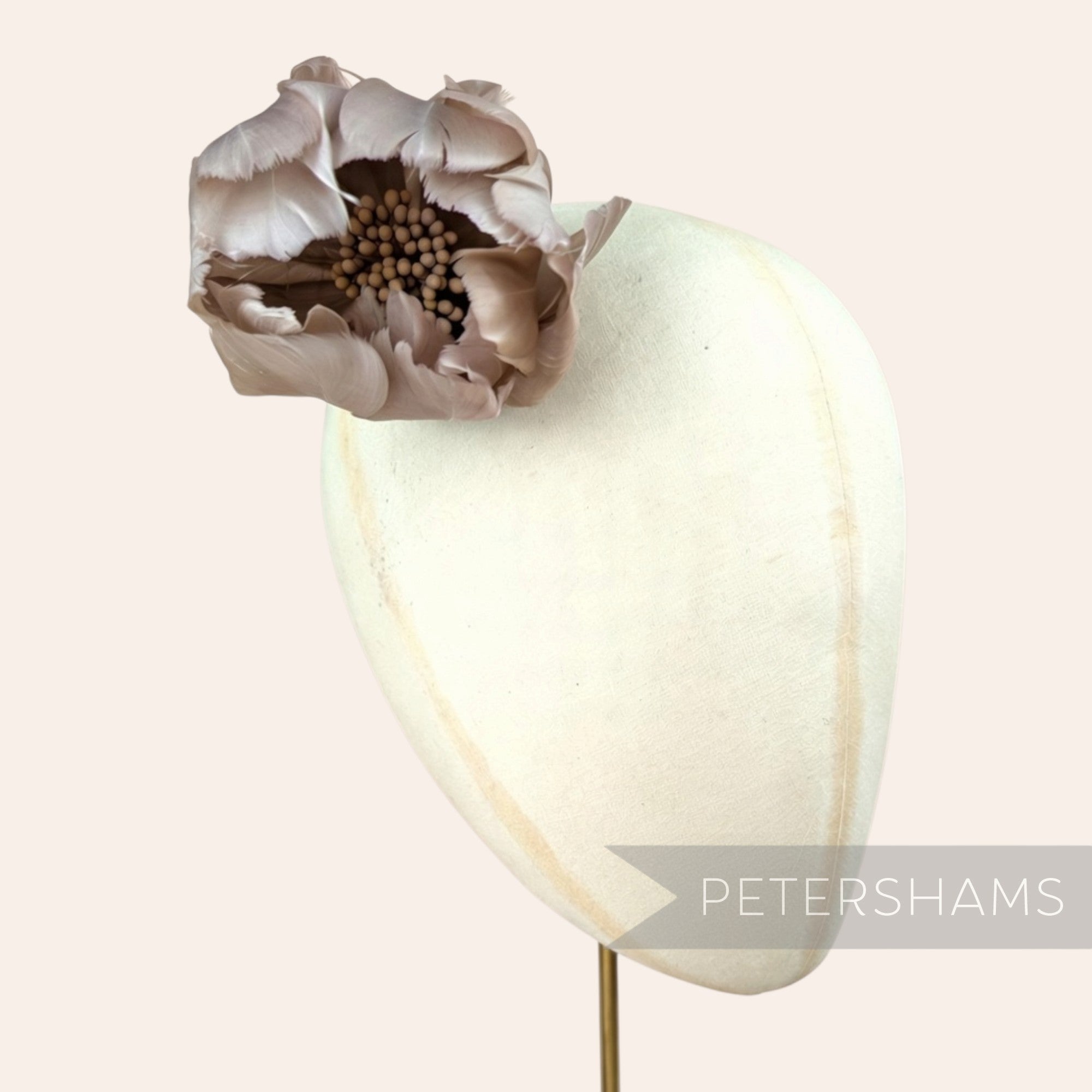 Petershams Millinery Supplies large tulip-shaped flower made from taupe goose nagorie feathers with central stamens.