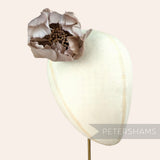 Petershams Millinery Supplies large tulip-shaped flower made from taupe goose nagorie feathers with central stamens.