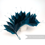 Petershams Millinery Supplies large spiky teal goose feather hat mount on a flexible wired stem for headpieces.