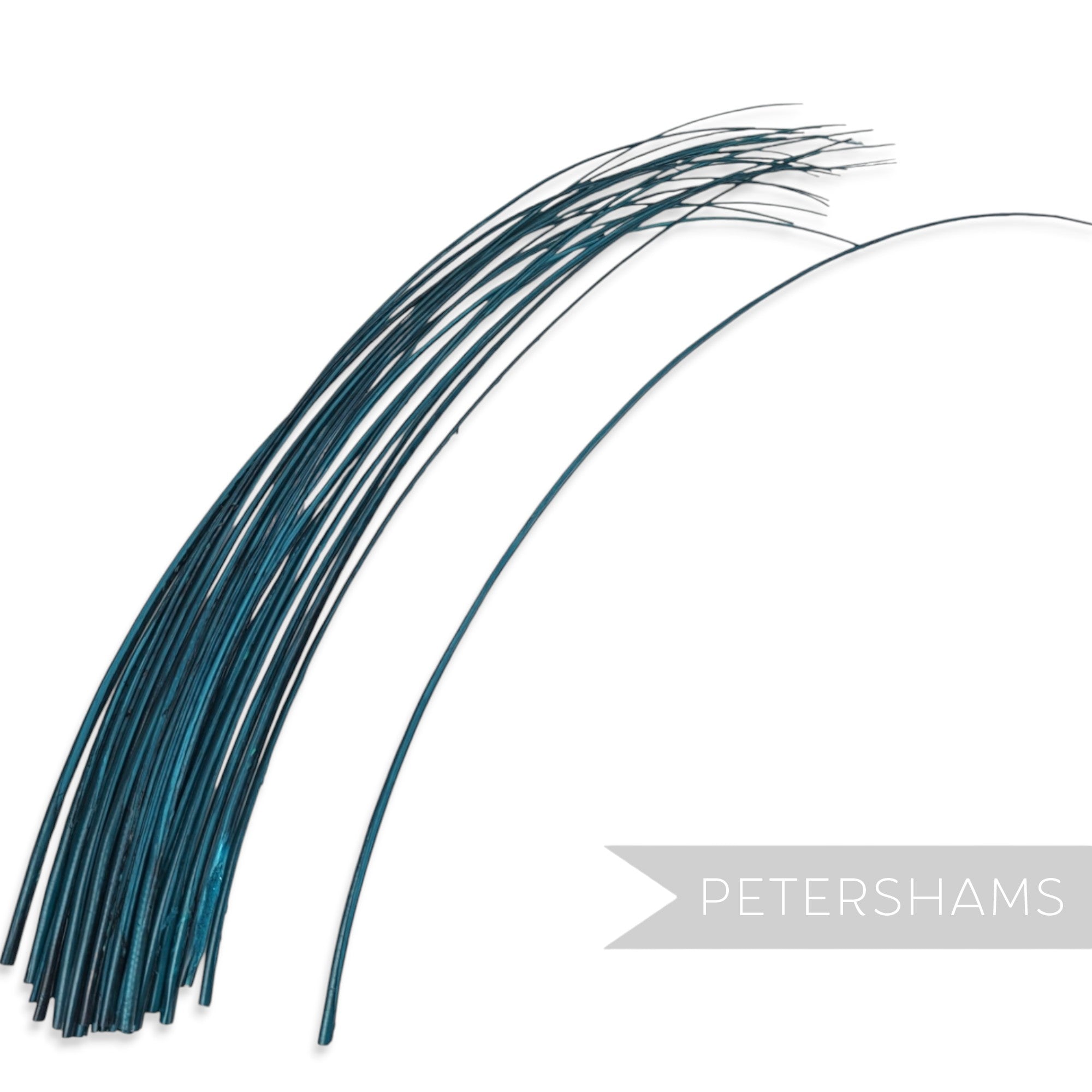Petershams Millinery Supplies dark teal stripped ostrich quill feathers for hat making and millinery projects.