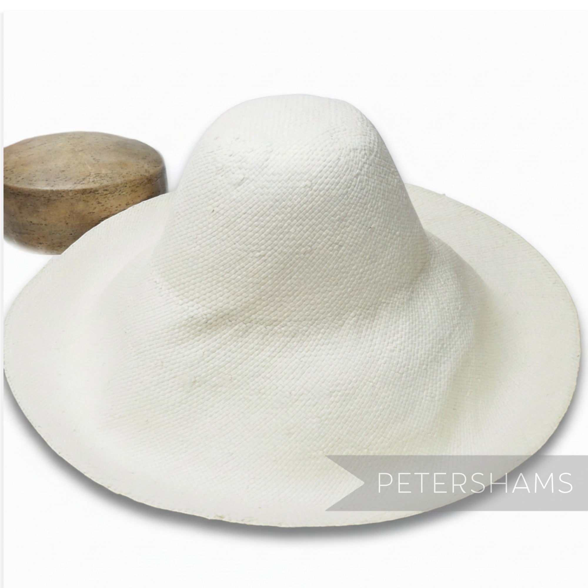 Petershams Millinery Supplies XL smooth ivory Toyo paper capeline hat body for DIY millinery projects.