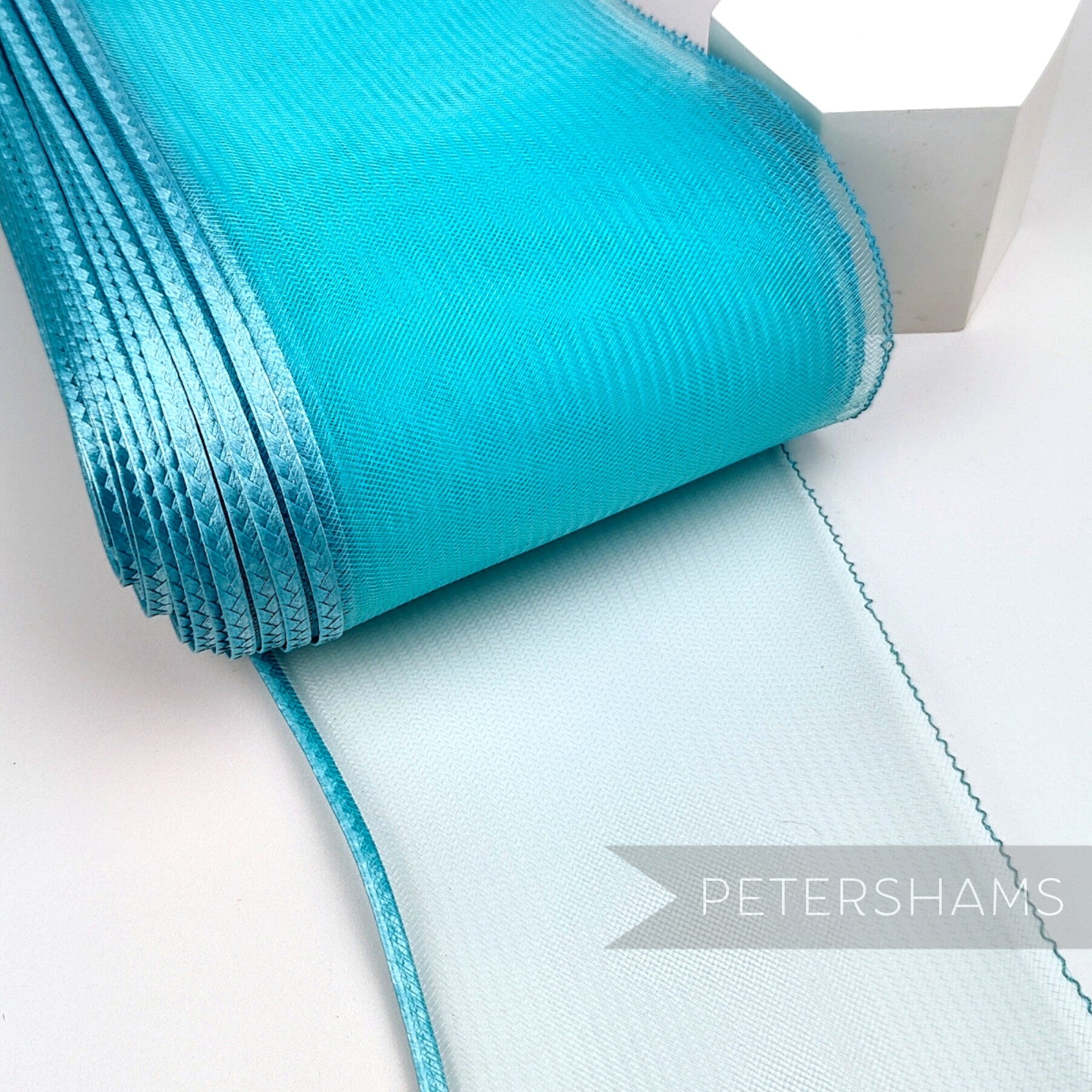 Petershams Millinery Supplies 15cm wide turquoise crinoline ribbon with a shiny polybraid edge for hat making