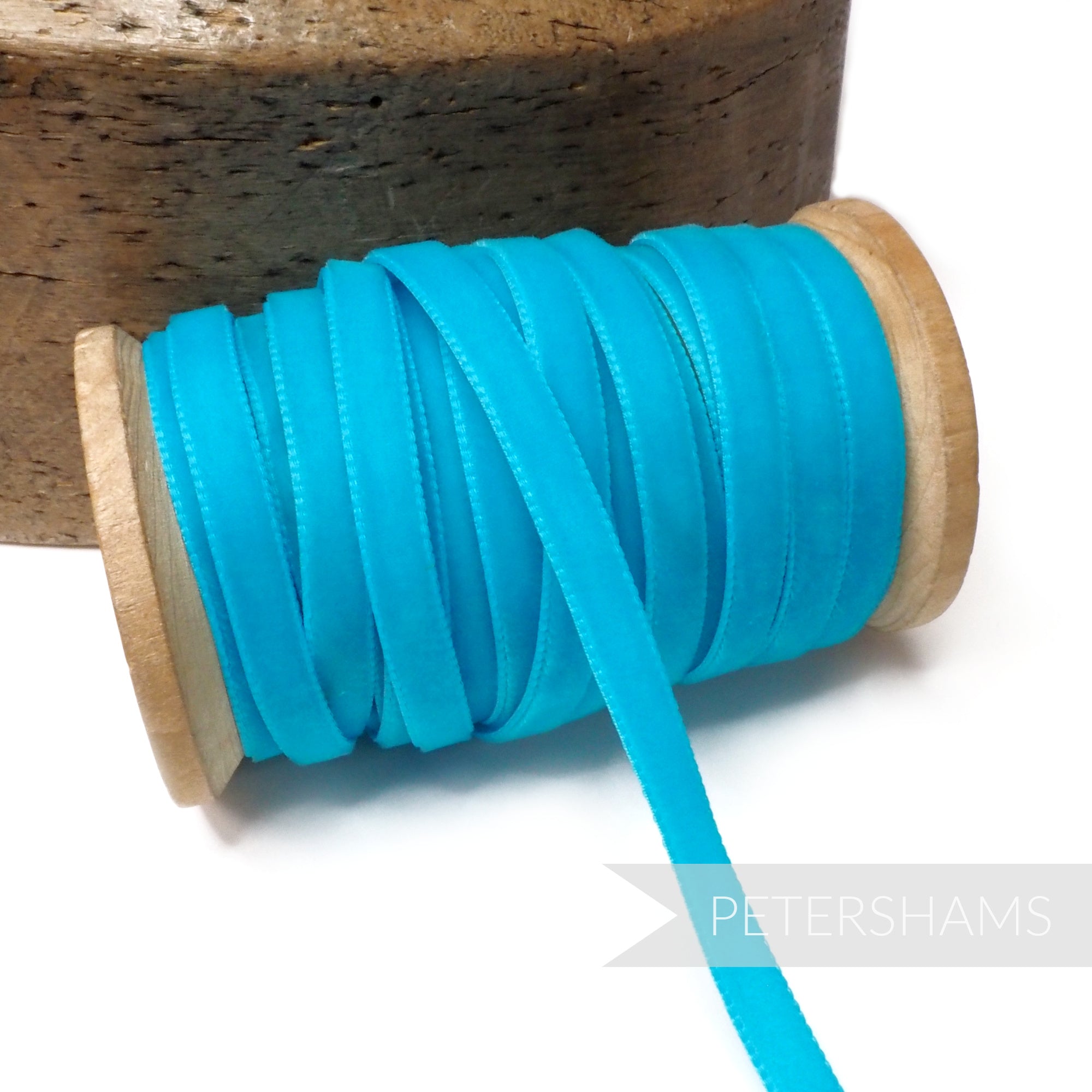 Petershams Millinery Supplies 7mm bright turquoise vintage rayon velvet ribbon on a wooden spool