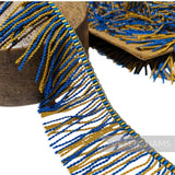 Petershams Millinery Supplies vintage two-tone blue and gold twisted rayon fringe trim with a woven top edge.