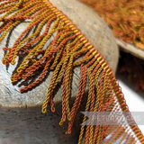 Petershams Millinery Supplies vintage two-tone orange and gold twisted rayon fringe trim with woven top edge