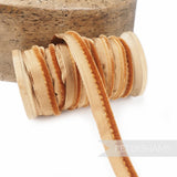 Petershams Millinery Supplies 5mm golden brown velvet insertion piping cord on a wooden spool for sewing and millinery