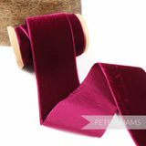 Petershams Millinery Supplies 50mm wide berry French velvet ribbon on a wooden spool for craft projects.