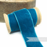 Petershams Millinery Supplies 36mm wide peacock blue French velvet ribbon on a wooden spool