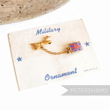 Petershams Millinery Supplies vintage 1940s gold airplane and Union Jack flag double brooch pin on original card