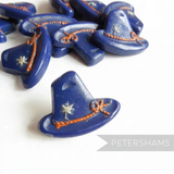 Petershams Millinery Supplies vintage blue Alpine hat buttons with rope and flower relief detail