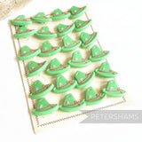 Petershams Millinery Supplies vintage green Alpine hat buttons with rope and flower relief detail