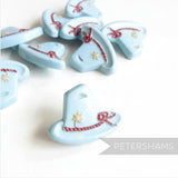 Petershams Millinery Supplies vintage 1940s Alpine hat buttons in light blue with red rope and flower relief detail