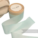 Petershams Millinery Supplies vintage 50mm aqua blue nylon ribbon roll for millinery and gift wrapping.