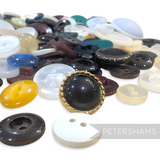 Petershams Millinery Supplies assorted vintage plastic buttons in various colours, shapes, and sizes from the 70s/80s.