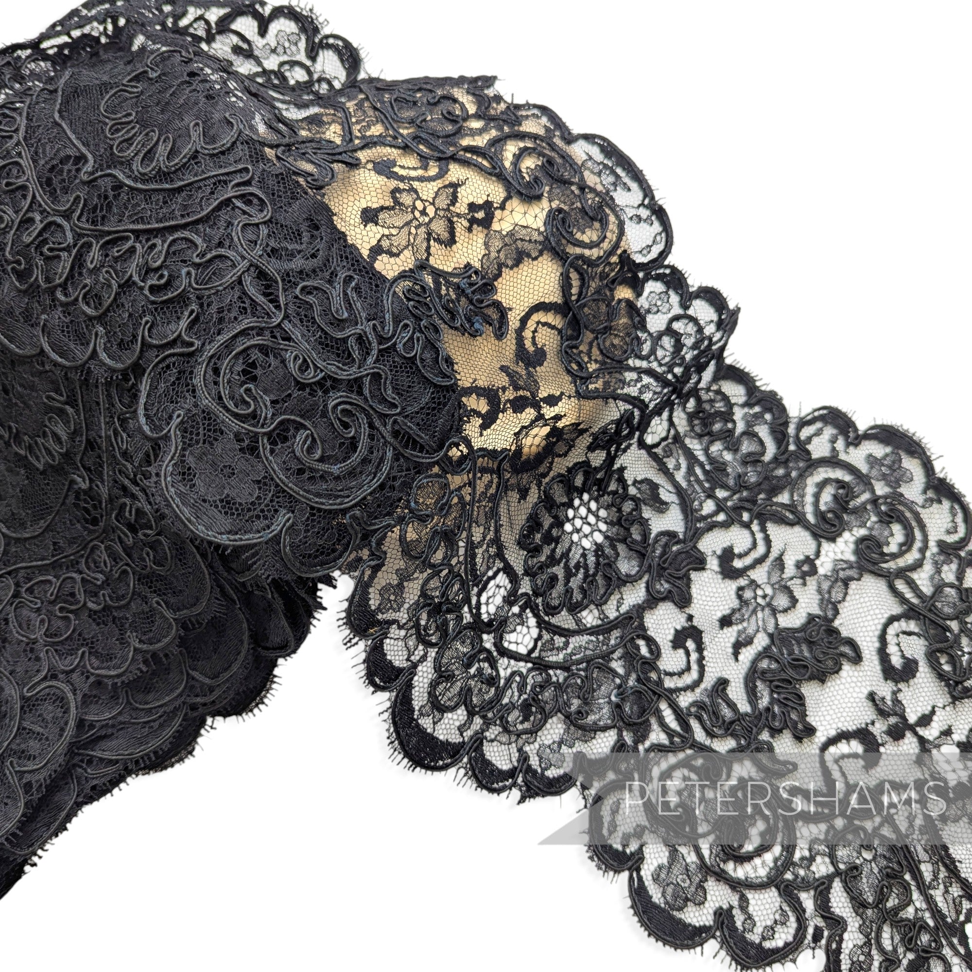 Petershams Millinery Supplies 1980s vintage black floral lace trim with double scalloped eyelash edges.