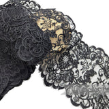 Petershams Millinery Supplies 1980s vintage black floral lace trim with double scalloped eyelash edges.