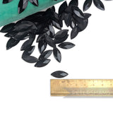 Petershams Millinery Supplies vintage 1940s black marquise jewel sequins with raised relief and two sew holes.