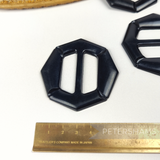 Petershams Millinery Supplies vintage 1940s black plastic octagon hat buckle measuring 6cm with ribbon slot