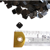 Petershams Millinery Supplies vintage black ribbed square sequins from the 1940s, measuring 6mm for bridal crafts.