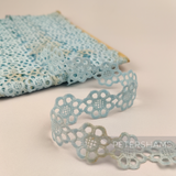 Petershams Millinery Supplies vintage light blue daisy lace trim with delicate floral pattern and slight discoloration