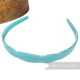 Petershams Millinery Supplies vintage 1960s light blue plastic headband with scallop edge detail. Perfect for younger adults or as a tiara band.