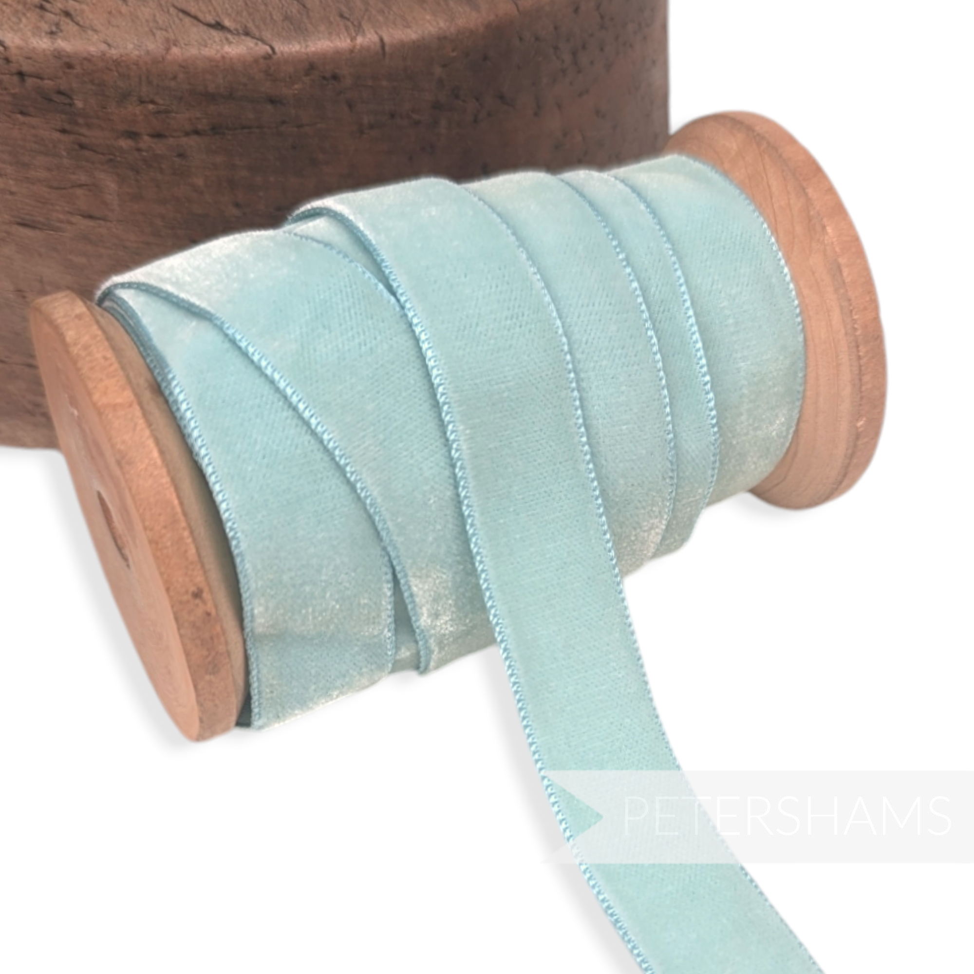 Petershams Millinery Supplies 16mm vintage light blue velvet ribbon on a wooden spool