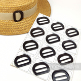 Petershams Millinery Supplies vintage 1950s chocolate brown D-shape plastic buckle on a straw hat and display card.