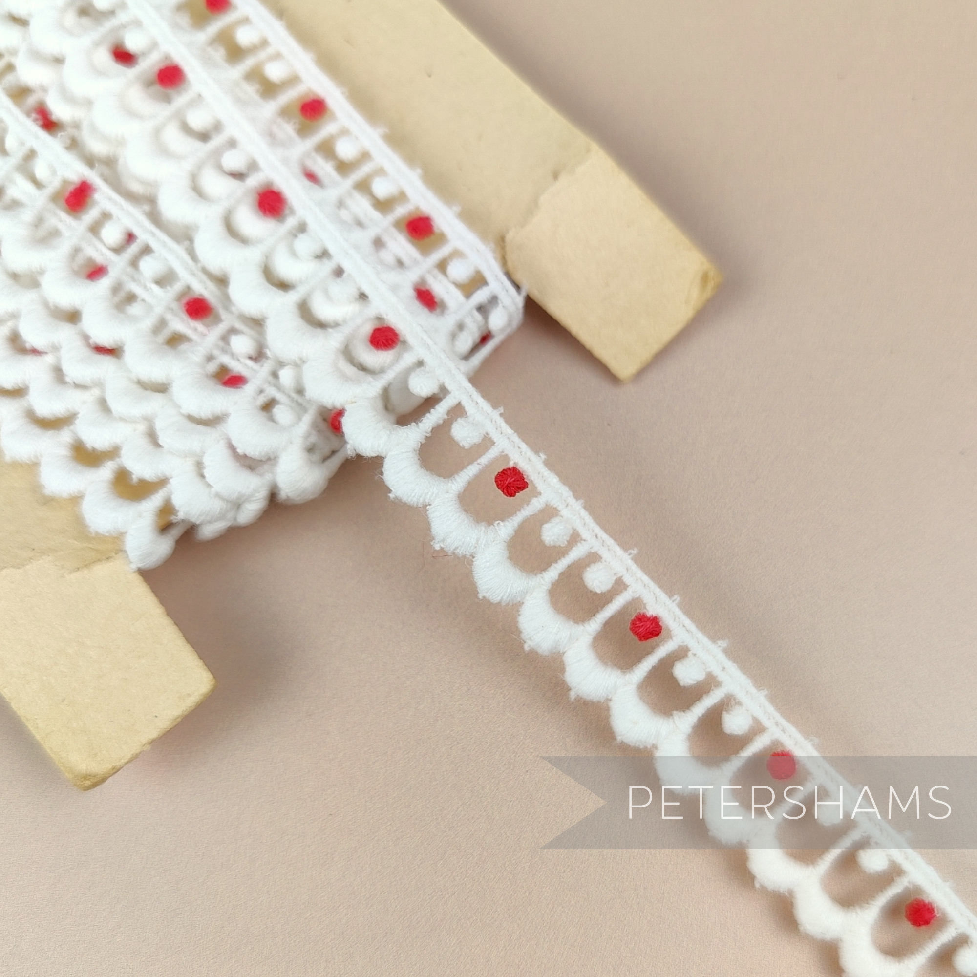 Petershams Millinery Supplies vintage 15mm off-white cotton guipure lace trim with red dot scallop detail