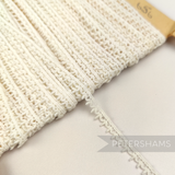 Petershams Millinery Supplies vintage 1950s English cotton Nottingham guipure lace trim with a teeny leafy design.