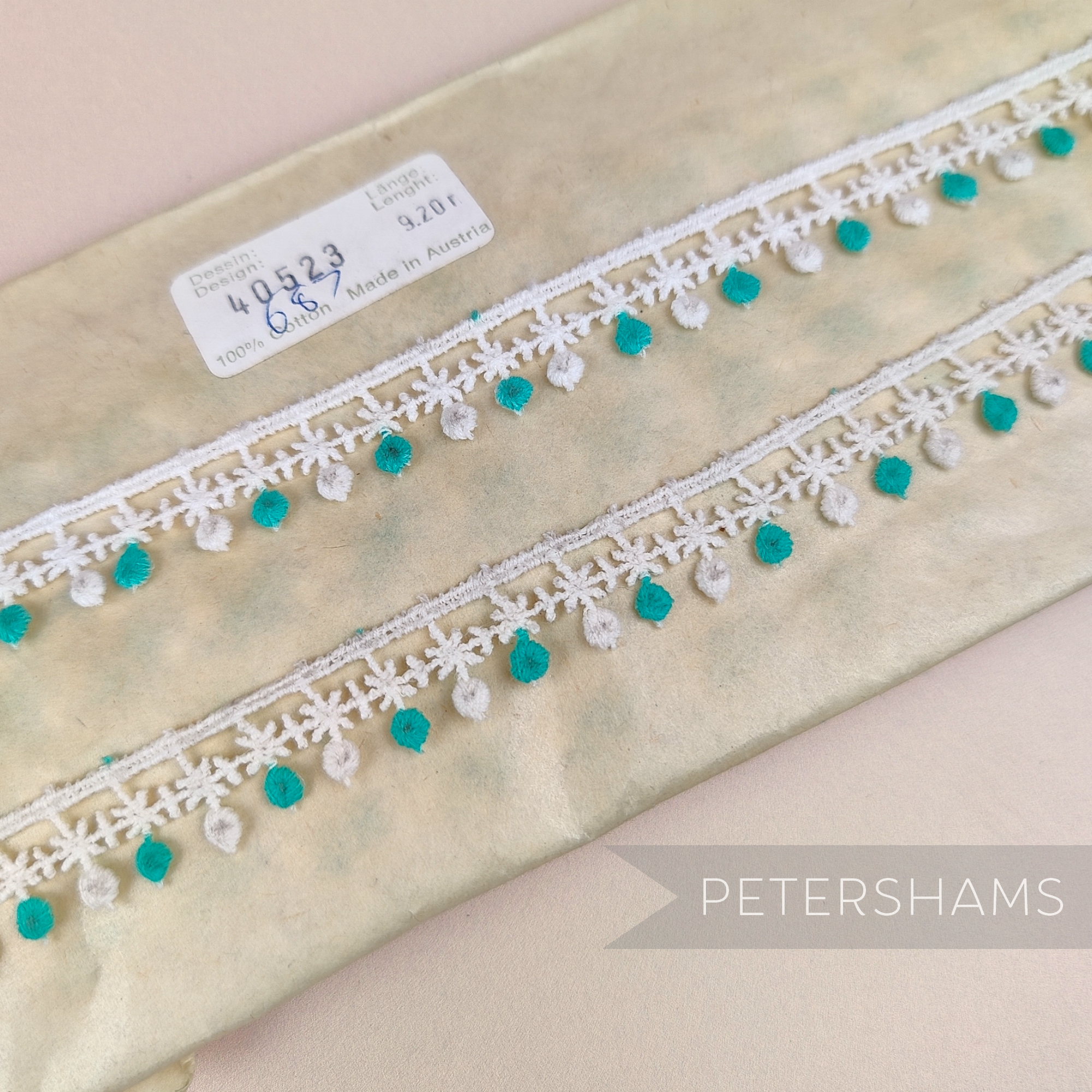 Petershams Millinery Supplies vintage 1950s Austrian cotton guipure lace trim with atomic star and jade dot pattern