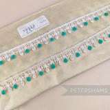 Petershams Millinery Supplies vintage 1950s Austrian cotton guipure lace trim with atomic star and jade dot pattern