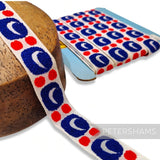 Petershams Millinery Supplies vintage 26mm woven cotton ribbon with blue and red bubbly pattern on white background
