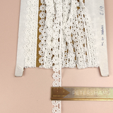 Petershams Millinery Supplies vintage 14mm off-white guipure lace trim featuring a delicate dahlia flower pattern.