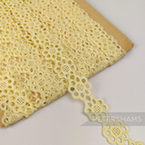 Petershams Millinery Supplies vintage 25mm pale yellow daisy lace trim from the 1950s or 1960s
