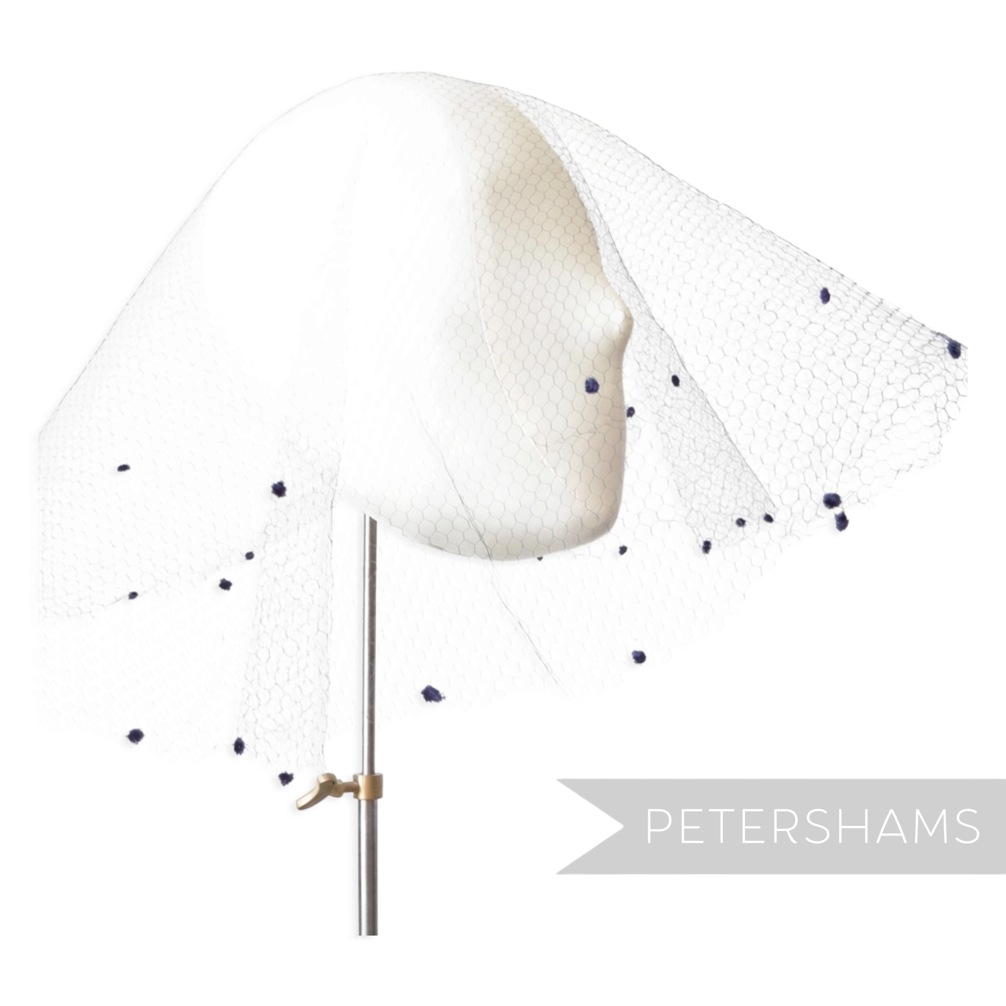 Petershams Millinery Supplies vintage 1930s honeycomb veiling round with double chenille dots draped on a mannequin head