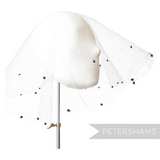 Petershams Millinery Supplies vintage 1930s honeycomb veiling round with double chenille dots draped on a mannequin head