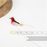 Petershams Millinery Supplies vintage multicolour feather bird ornament with wired stem and hand-painted details.