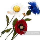 Petershams Millinery Supplies vintage German feather flowers including a red poppy, white daisy, and blue cornflower.