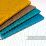 Petershams Millinery Supplies vintage fine weave nylon veiling in mustard, brown, and teal shades with 5mm diamonds.