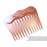 Petershams Millinery Supplies vintage 1970s pearlescent peach hair comb with a raised floral relief motif