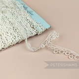 Petershams Millinery Supplies vintage 15mm natural cotton guipure lace trim with a delicate loopy loop design.