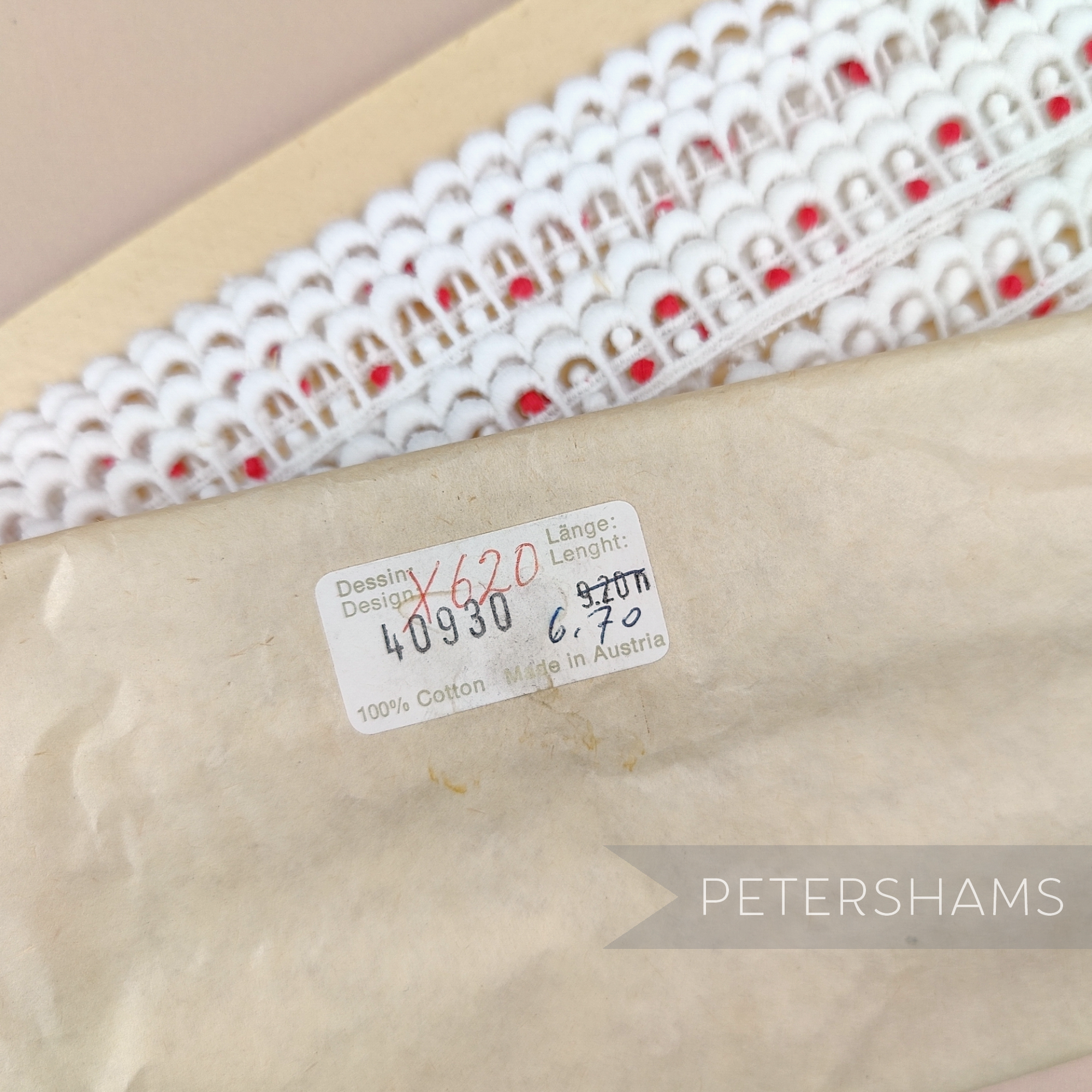 Petershams Millinery Supplies vintage 15mm off-white and red cotton guipure lace trim with a scalloped design.