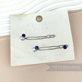 Petershams Millinery Supplies vintage 1960s Holdette metal hair barrettes with blue and white accents on original card