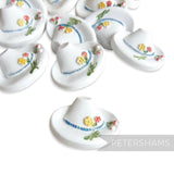 Petershams Millinery Supplies vintage white hat buttons with floral and cherry relief, blue trim, 1940s/50s style.