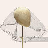 Petershams Millinery Supplies vintage 1930s honeycomb veiling round with chainlink stitch and small swirl details.