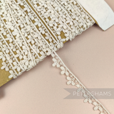 Petershams Millinery Supplies vintage 13mm ivory cotton guipure lace trim with star and fleur droplet design