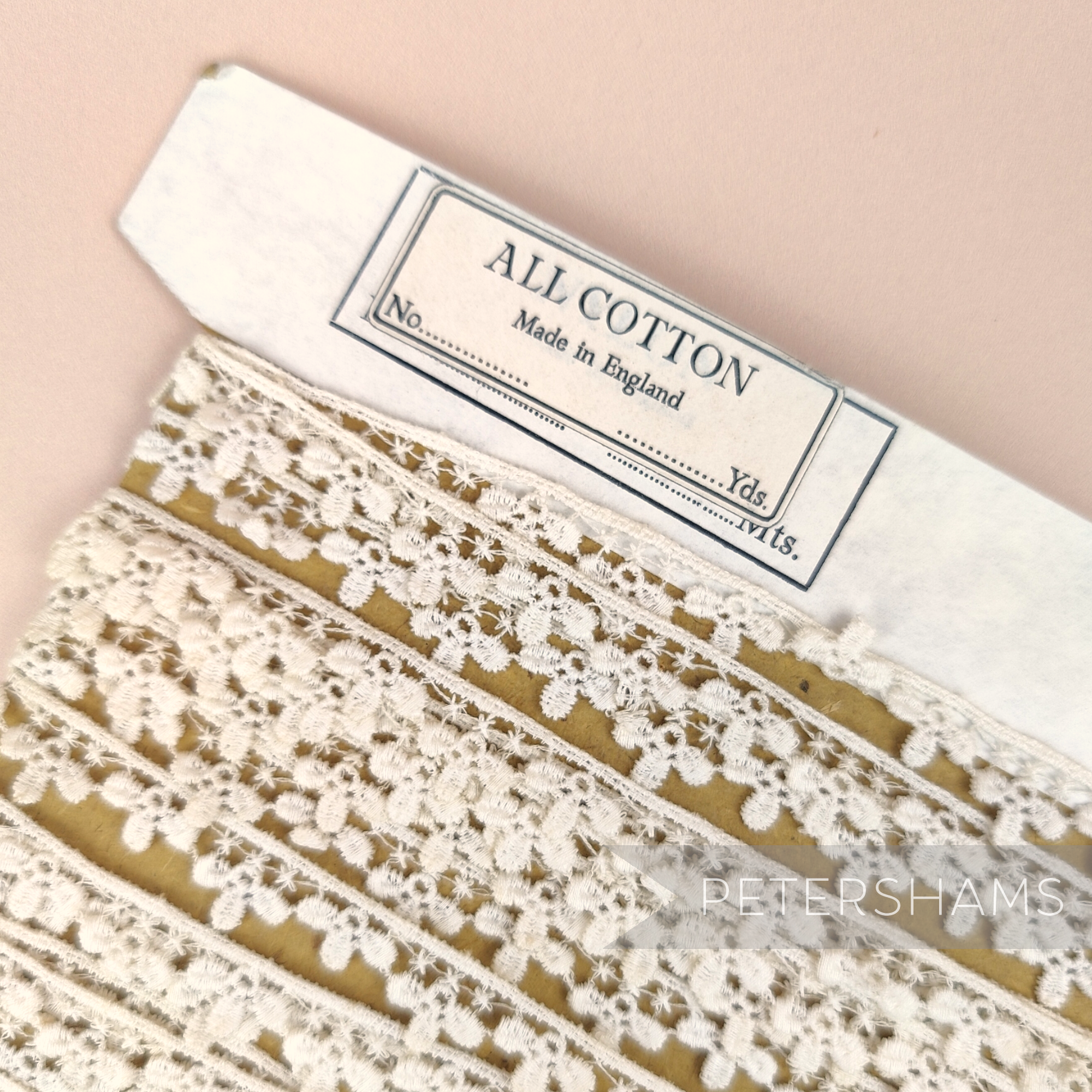Petershams Millinery Supplies vintage 1950s ivory cotton guipure lace trim with star and fleur droplet design